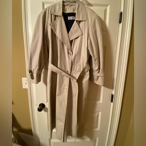 John Weitz trench coat. Size 8-10. Wool lining, sleeve adjustment.